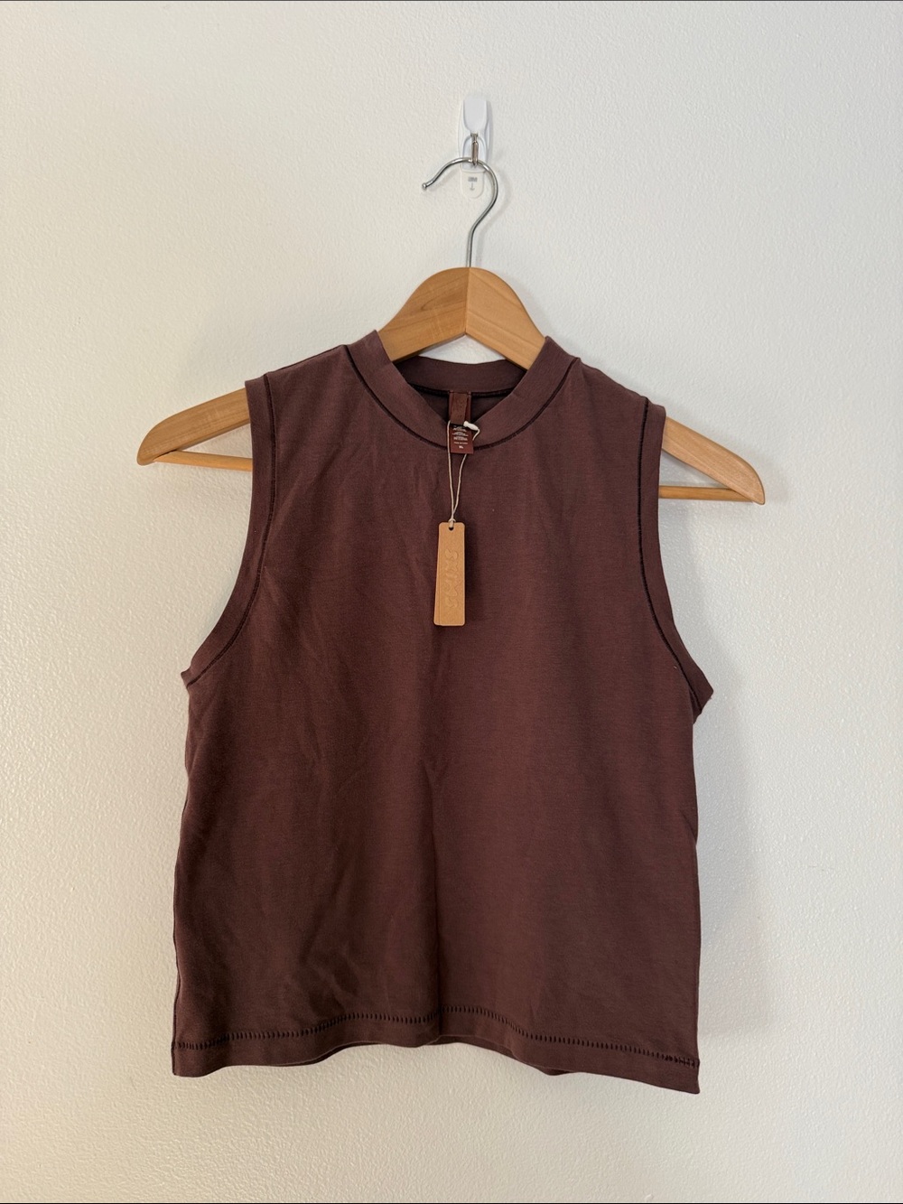 SKIMS Sleeveless Mock Neck Tank in Dark Brown color Garnet